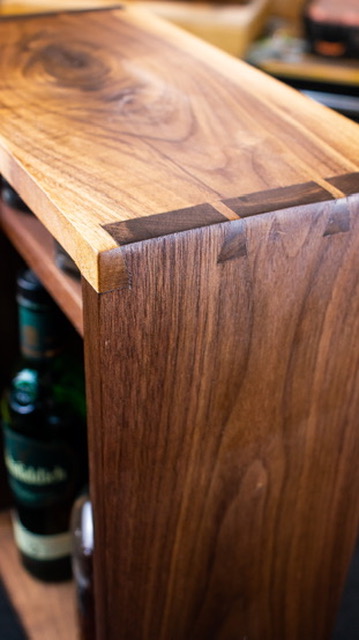 Cherry cabinet — dovetail corner detail close-up